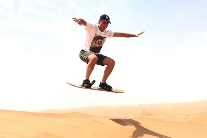 Red Dune Desert Safari Dubai: Sandboarding, Dune Bashing & Camel Ride photo 2