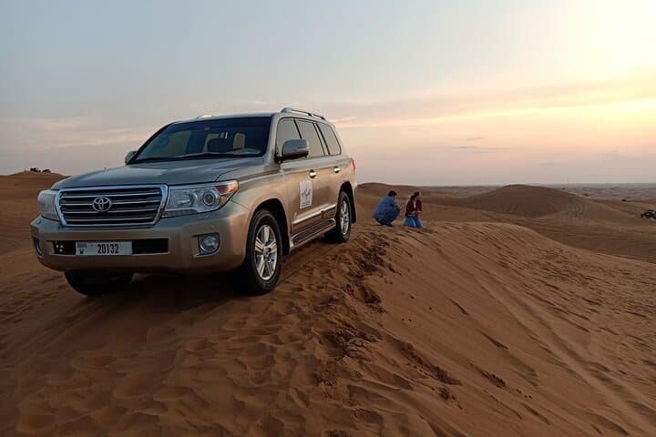 Red Dune Desert Safari Dubai: Sandboarding, Dune Bashing & Camel Ride photo 4