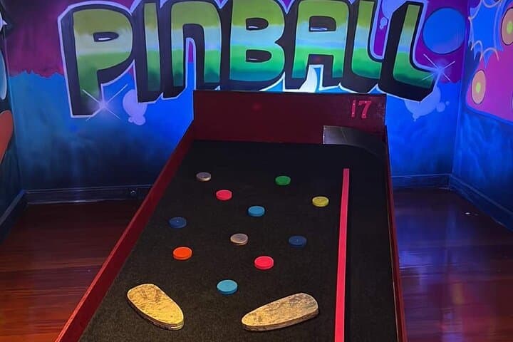 Glow-and-Putt: Porto Indoor Mini Golf with Neon Bar photo 3