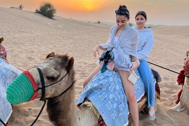 Dubai Desert Safari: Dune Bashing, Camel Ride, Sandboarding & Bedouin BBQ Experience photo 2