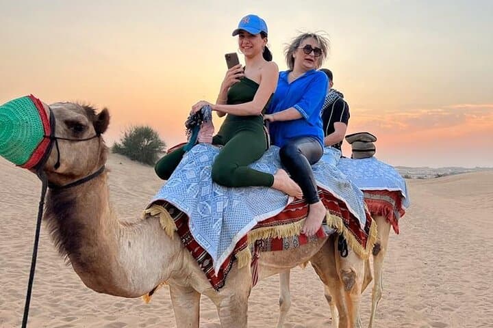 Dubai Desert Safari: Dune Bashing, Camel Ride, Sandboarding & Bedouin BBQ Experience photo 5