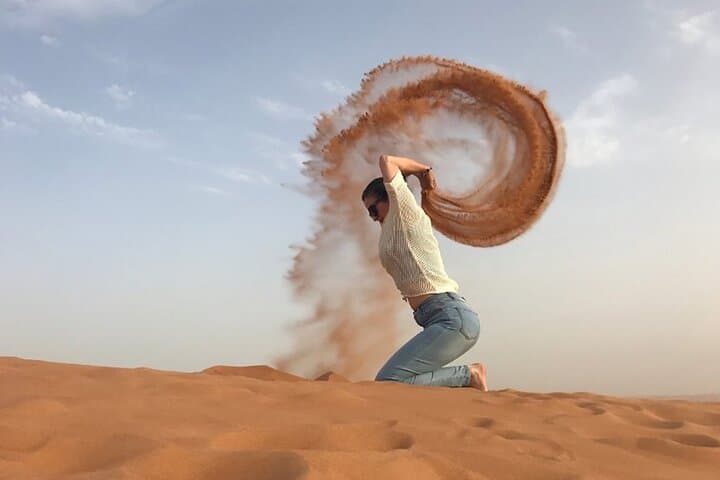Sunrise Desert Safari: Red Dune Bashing, Sandboarding & Camel Ride in Dubai photo 3