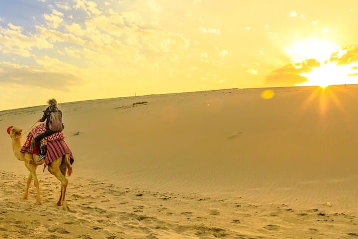 Sunrise Desert Safari Abu Dhabi — Private Camel Ride & Sandboarding Experience