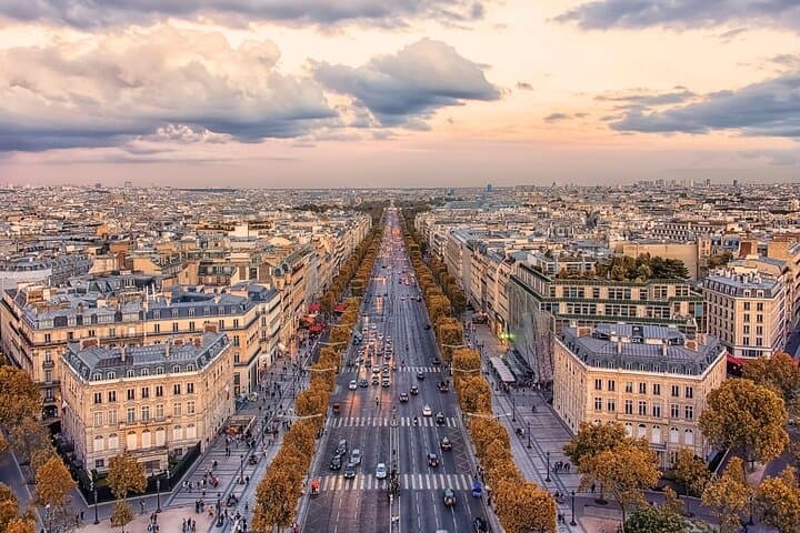 Full-Day Paris from Le Havre: Seine Cruise, Eiffel Views & Champs-Élysées photo 4
