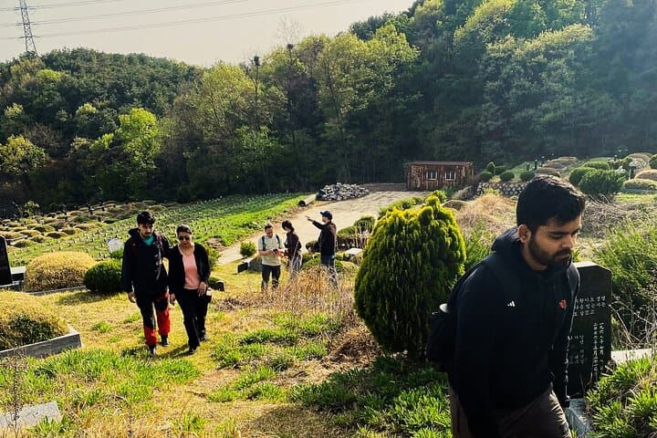 Korean Cemetery and Folklore Trek: Fall Hike Through Mountain Graves Near Seoul photo 5