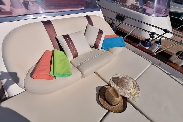Capri Luxury Gozzo: 3-Hour Private Cruise to Blue Grotto, Faraglioni & Swim Stops photo 2