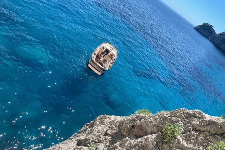 Capri Luxury Gozzo: 3-Hour Private Cruise to Blue Grotto, Faraglioni & Swim Stops photo 4
