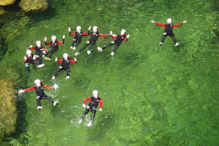 Half-Day Canyon Borne Canyoning in Ardèche — Jumps, Slides & River Pools photo 4