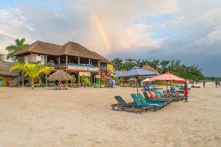 Parasailing Over Negril’s Seven Mile Beach and Ricks Cafe Sunset Day Trip