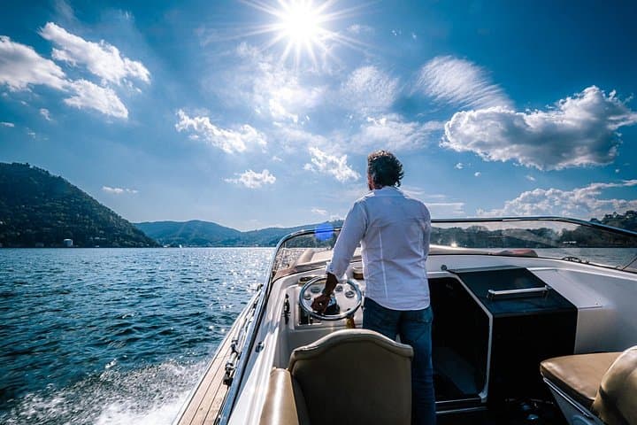 One-Hour Private Motorboat Cruise on Lake Como: Villas, Sculpture & Shoreline Views photo 1