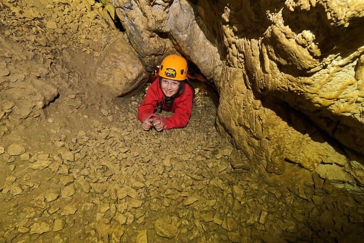 Half-Day Caving Adventure in Ardèche: Abseils, Narrow Passages & Spectacular Concretions
