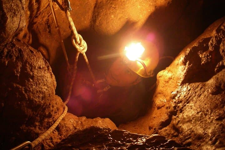Half-Day Caving Adventure in Ardèche: Abseils, Narrow Passages & Spectacular Concretions photo 4
