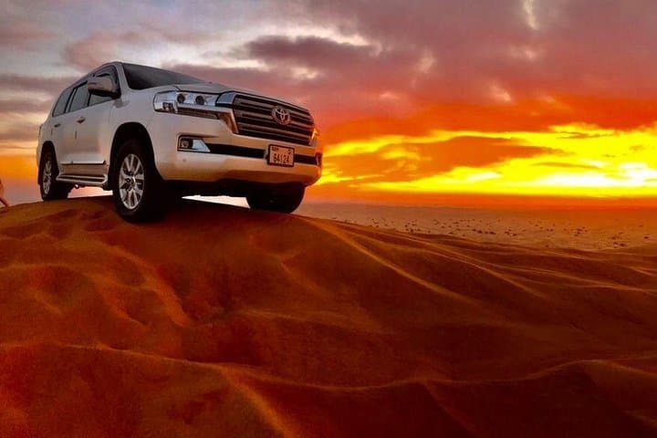 Dubai Private Morning Desert Safari: Dune Bashing, Camel Ride & Sandboarding photo 2