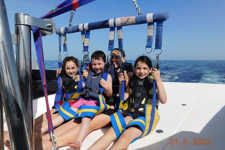 Parasail Over St. Julian's Bay: 500-Foot Views with Photos & Videos photo 3