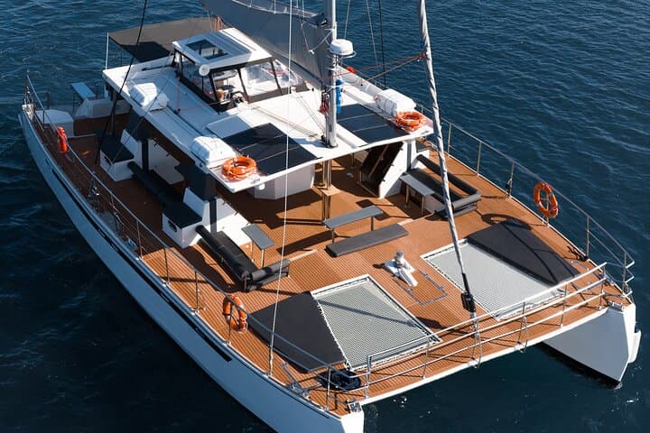 Santorini Caldera Catamaran Cruise with BBQ, Snorkeling & Open Bar