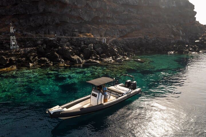 Private Half-Day Motor Boat Cruise in Santorini: Caldera, Hot Springs & Thirassia photo 2