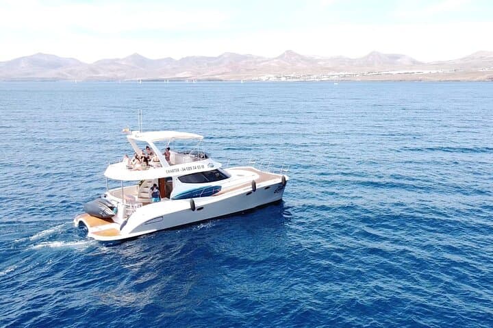Sailing Lanzarote: Puerto del Carmen Catamaran with Snorkel, SUP & Banana Boat photo 3