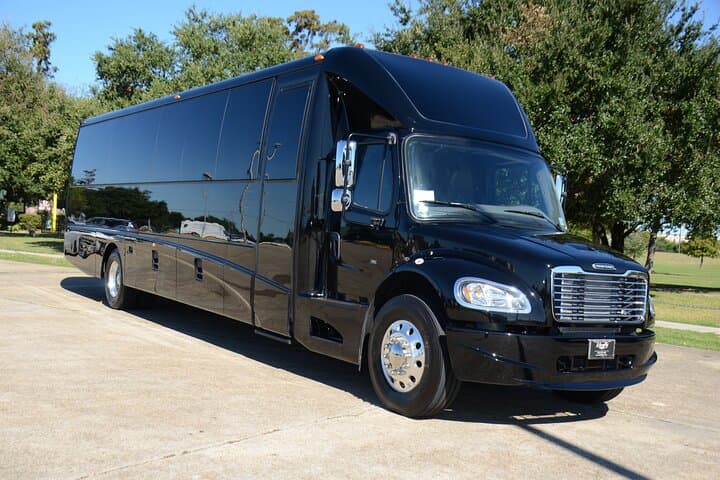 Private 39-Passenger Transfer from MSY/Port to Downtown New Orleans