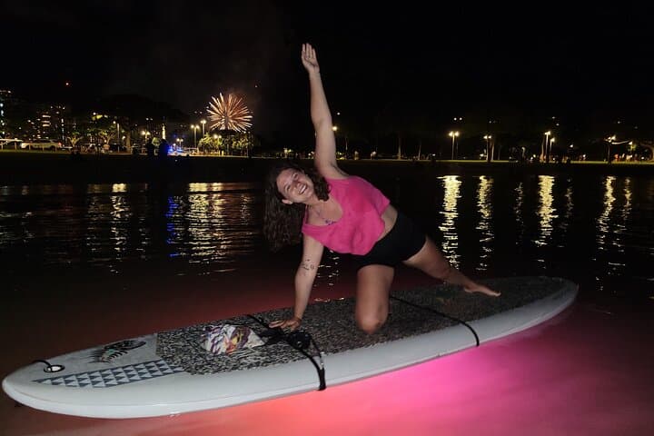 Night SUP Yoga and Fireworks at Magic Island — Honolulu LED Paddle & Sunset Yoga photo 1
