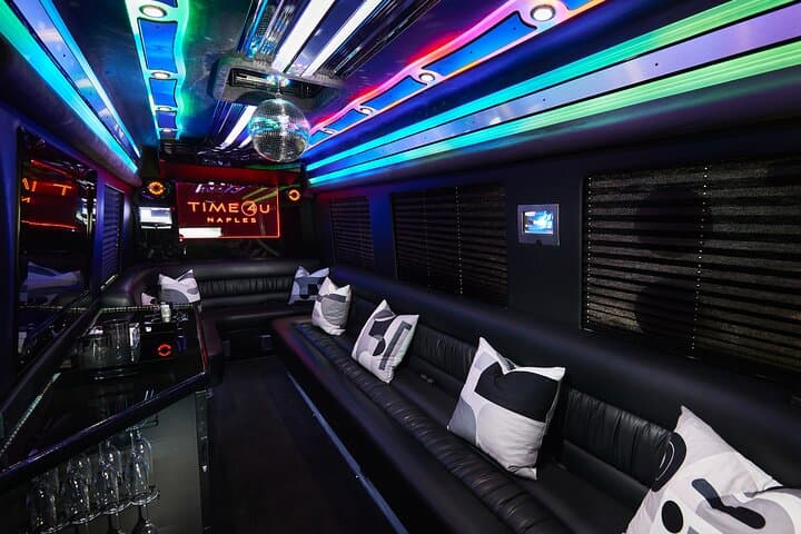 Naples Party Bus Rental — Disco Ball, Limo Seating, Bar & LED Lights