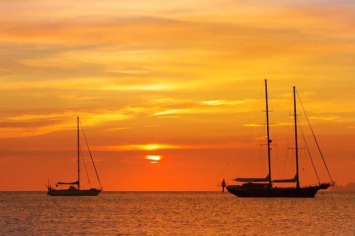 Sunset Boat Tour in Ibiza: All-Inclusive Cruise with Snorkel & Paddleboard photo 1
