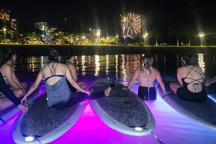 Night SUP Yoga and Fireworks at Magic Island — Honolulu LED Paddle & Sunset Yoga photo 4