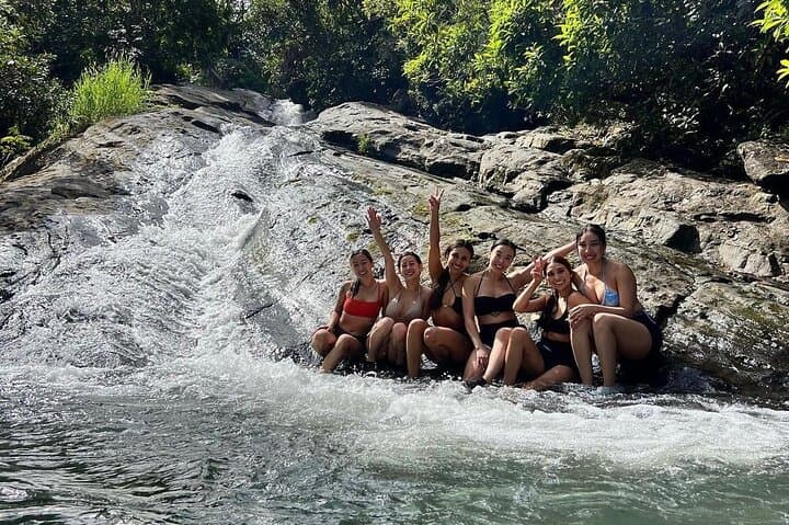 El Yunque Waterfall Slides & Luquillo Beach — Rainforest Adventure with Drinks photo 2