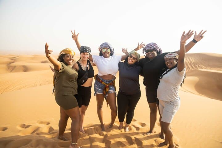 Dubai Red Dunes Half-Day Safari: Dune Bashing, Sandboarding, Camel & Falcon Experience