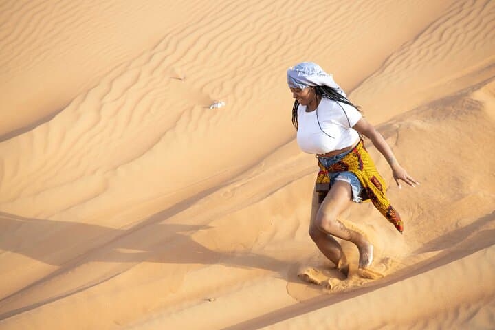 Dubai Red Dunes Half-Day Safari: Dune Bashing, Sandboarding, Camel & Falcon Experience photo 3