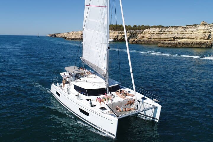 Albufeira to Benagil: 4-Hour Luxury Catamaran Cruise Along the Algarve Coastline photo 2