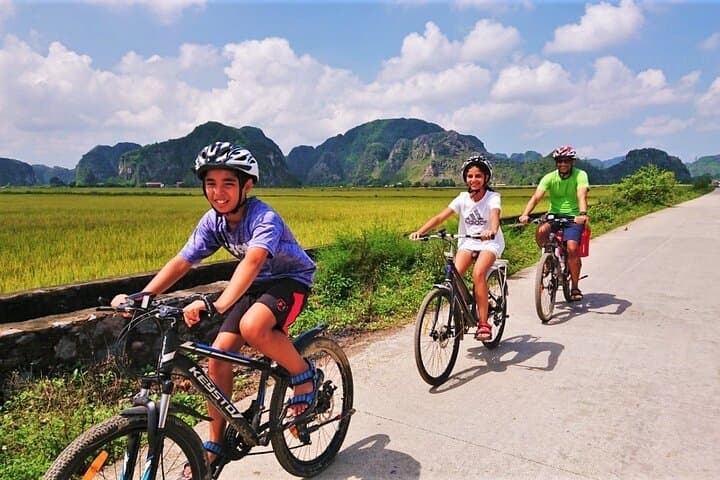 Tam Coc & Hoa Lu Day Tour: Cycling Rice Fields, Boat Caves and Ancient Capital photo 4