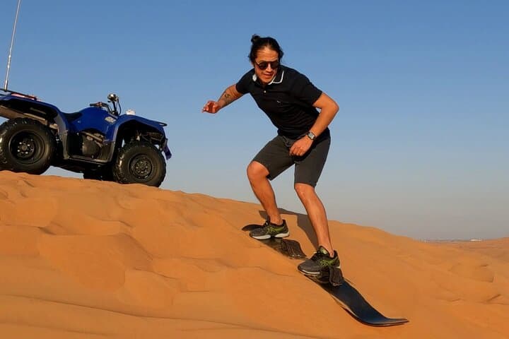 Dubai Desert Quad Bike Safari: Sandboarding, Camel Ride & Red Dunes Adventure photo 6