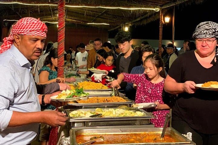 Red Dune Desert Safari Dubai: Camel Ride, Sandboarding & BBQ Dinner photo 4