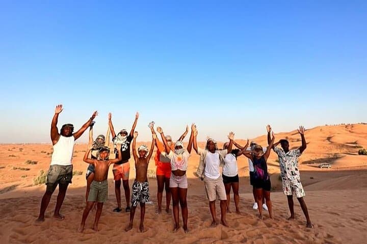 Dubai Short Desert Visit: Camel Ride, Dune Bashing & Sandboarding