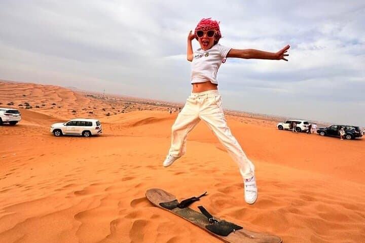 Dubai Short Desert Visit: Camel Ride, Dune Bashing & Sandboarding photo 2