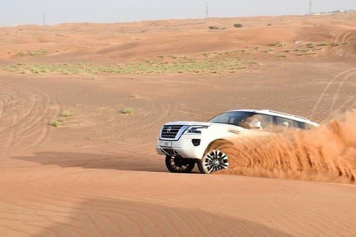 Private Morning Red-Dune Safari in Lahbab — Camel Ride, Sandboarding & Dune Bashing photo 2