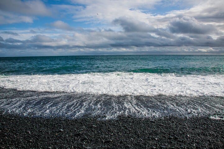 Full-Day South Coast to Vík: Waterfalls, Black Sand & Basalt Columns photo 5
