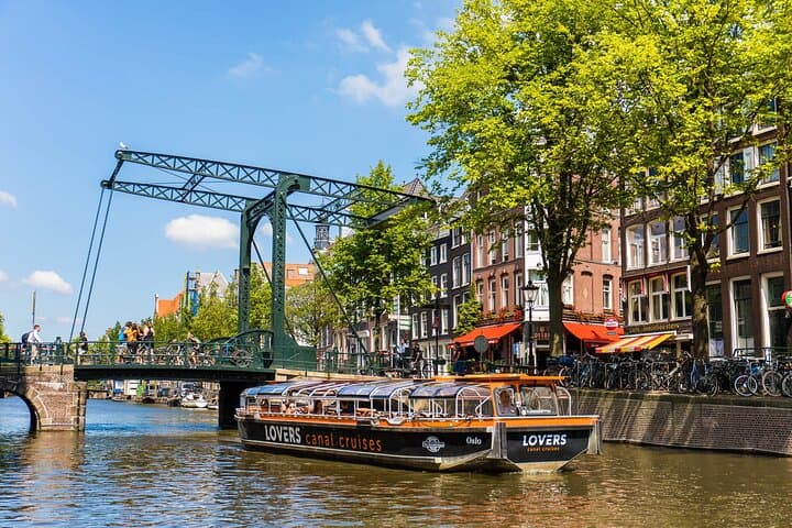 Amsterdam 1-Hour Solar Canal Cruise: Semi-Open Boat with Multilingual Audio Guide photo 2
