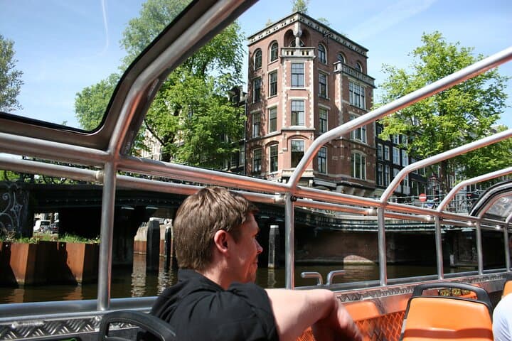 Amsterdam 1-Hour Solar Canal Cruise: Semi-Open Boat with Multilingual Audio Guide photo 3