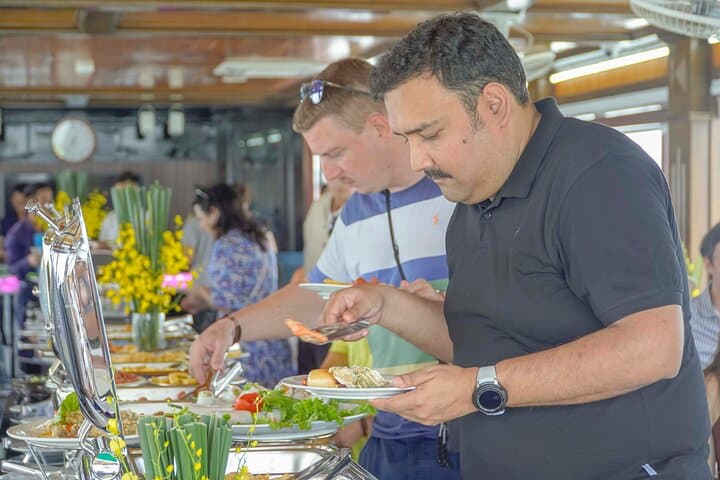 Premium Day Cruise in Halong Bay: Buffet Lunch, Kayaking & Sunset Party photo 6