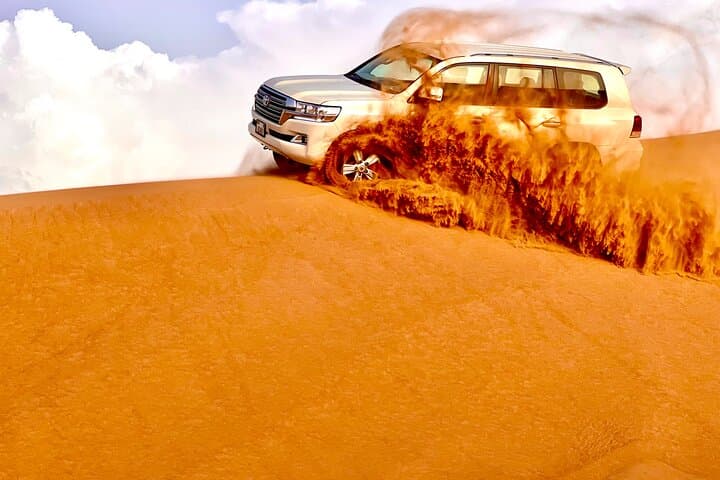 Dubai Desert Safari: Dune Bashing, Camel Ride & BBQ Experience
