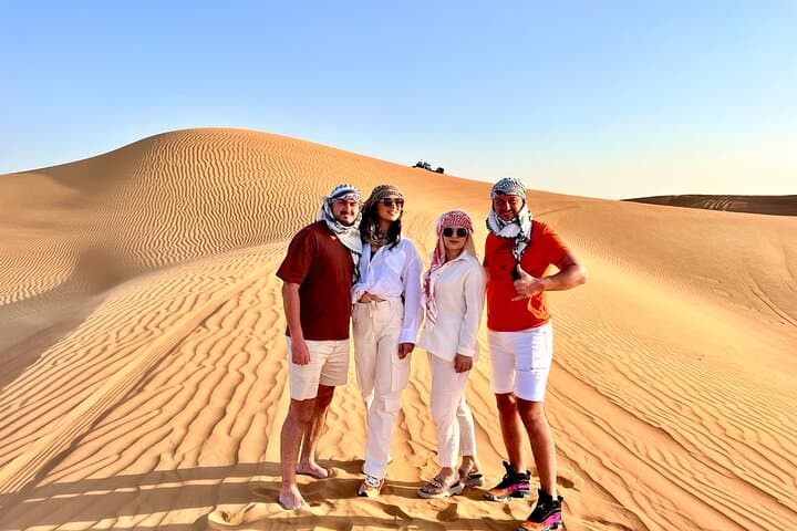Dubai Desert Safari: Dune Bashing, Camel Ride & BBQ Experience photo 2