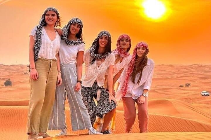 Premium Red Dunes Evening Desert Safari in Dubai — Dune Bashing, Sandboarding & BBQ photo 2