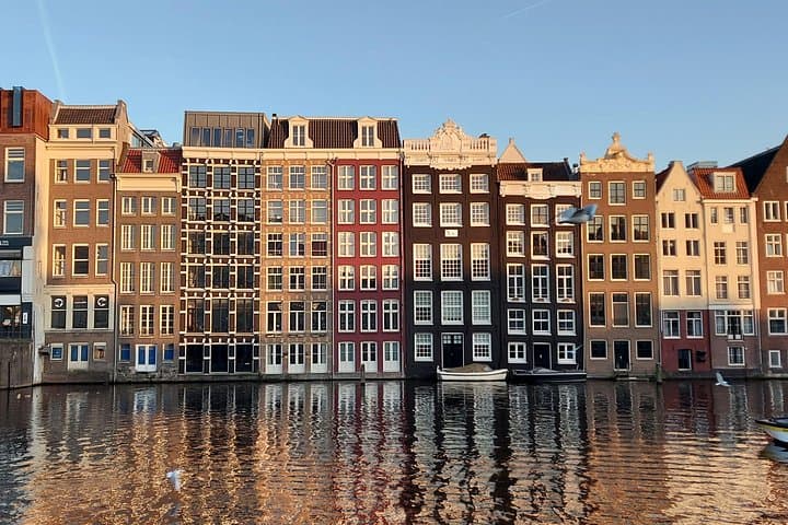 Layover in Amsterdam: Canal Cruise, Walking Tour & Airport Transfer photo 2