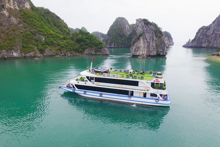 Full-Day Halong Bay Cruise: Bamboo Boat, Kayak & Titov Island Experience