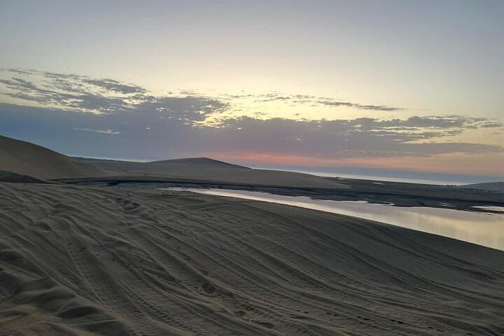 Qatar Private Desert Safari: 4-Hour Sunrise Dune Bashing & Sandboarding photo 6