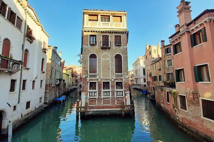 Venice Unveiled: Walking Tour and Shared Gondola Experience photo 4