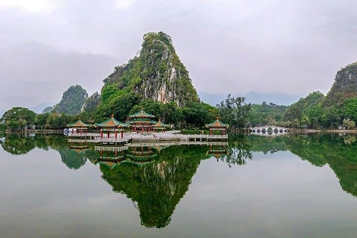 Explore Seven Star Crags: Zhaoqing Karst Lakes, Caves & Bird Islands