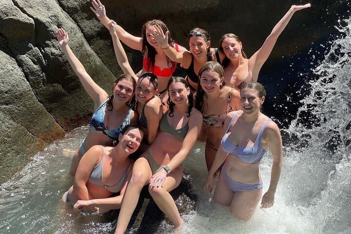 El Yunque Rainforest Waterslides, Waterfalls & Luquillo Beach Day Trip from San Juan