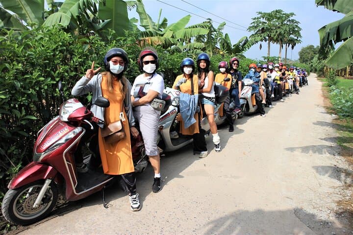 Hanoi Motorbike Tour Led by Women: Vespa Sunrise Ride from Old Quarter to Red River Villages photo 2